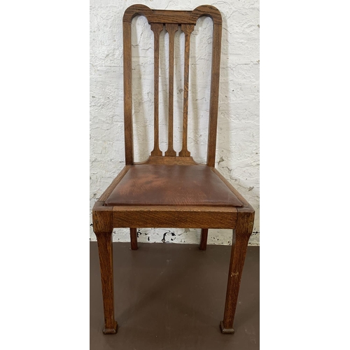 189 - Four early 20th century oak and brown vinyl dining chairs - approx. 105cm high x 45cm wide x 44cm de... 