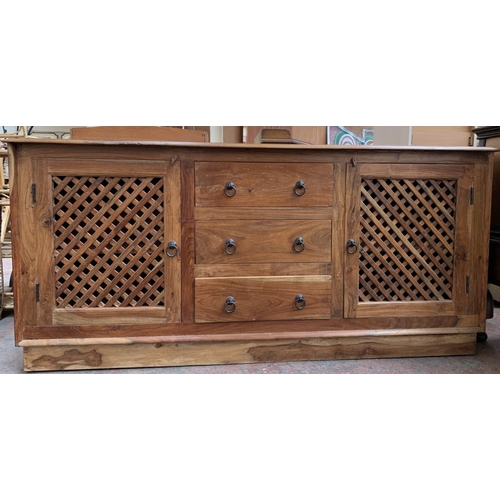 207 - An Indonesian hardwood sideboard with two latticework cupboard doors and three central drawers - app... 