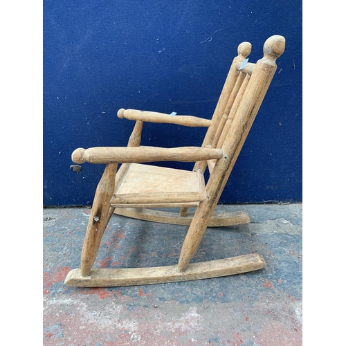 208 - A vintage beech child's rocking chair - approx. 52cm high x 36cm wide x 48cm deep