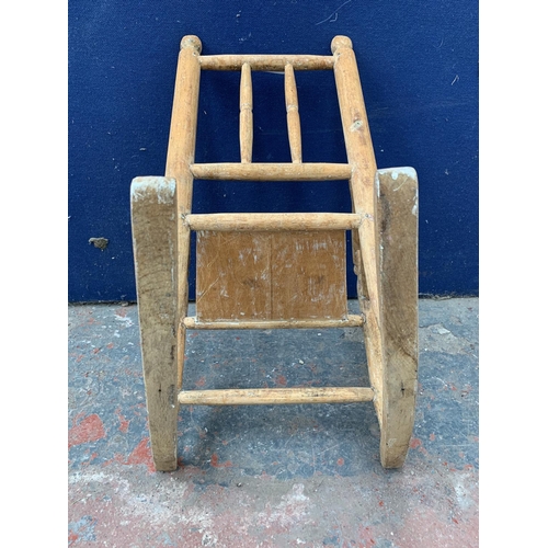 208 - A vintage beech child's rocking chair - approx. 52cm high x 36cm wide x 48cm deep