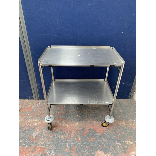 210 - An industrial aluminium two tier trolley - approx. 88cm high x 74cm wide x 45cm deep