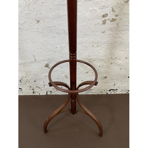 212 - A mahogany and bentwood freestanding five section coat stand - approx. 182cm high