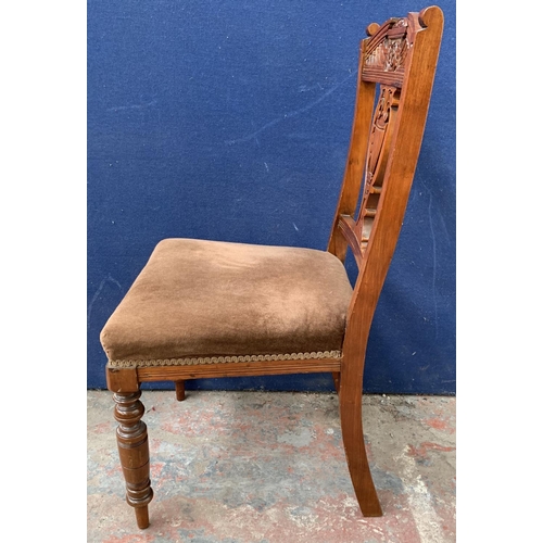 214 - A pair of late Victorian mahogany and brown upholstered dining chairs - approx. 90cm high x 46cm wid... 