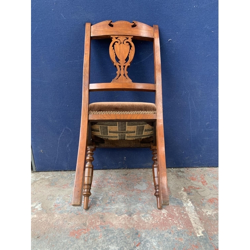 214 - A pair of late Victorian mahogany and brown upholstered dining chairs - approx. 90cm high x 46cm wid... 