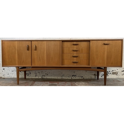 218 - A mid 20th century G Plan Brasilia teak sideboard - approx. 78.5cm high x 205.5cm long x 45.5cm deep