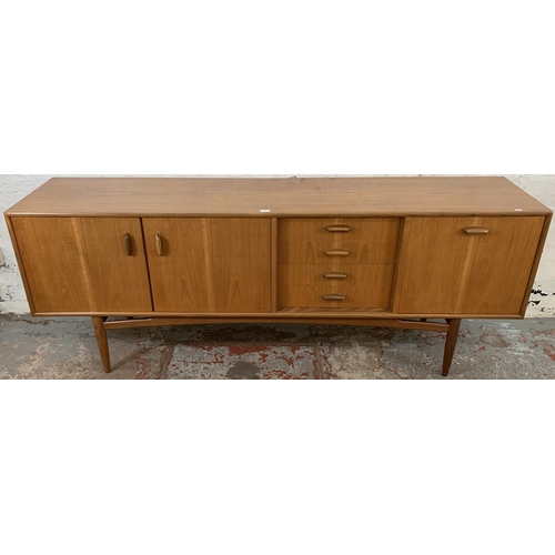 218 - A mid 20th century G Plan Brasilia teak sideboard - approx. 78.5cm high x 205.5cm long x 45.5cm deep