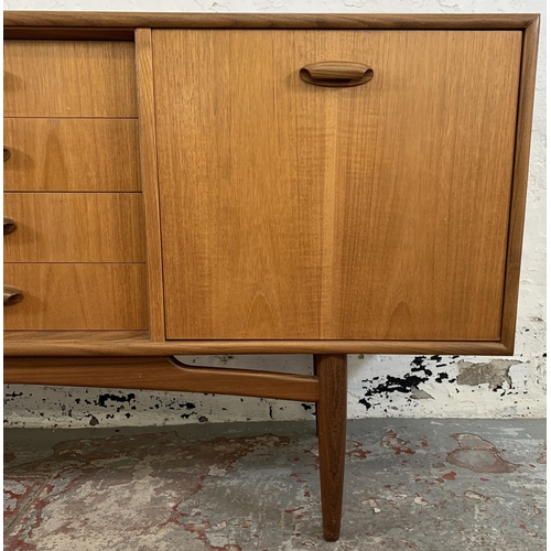 218 - A mid 20th century G Plan Brasilia teak sideboard - approx. 78.5cm high x 205.5cm long x 45.5cm deep