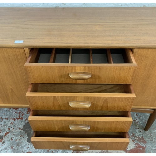 218 - A mid 20th century G Plan Brasilia teak sideboard - approx. 78.5cm high x 205.5cm long x 45.5cm deep