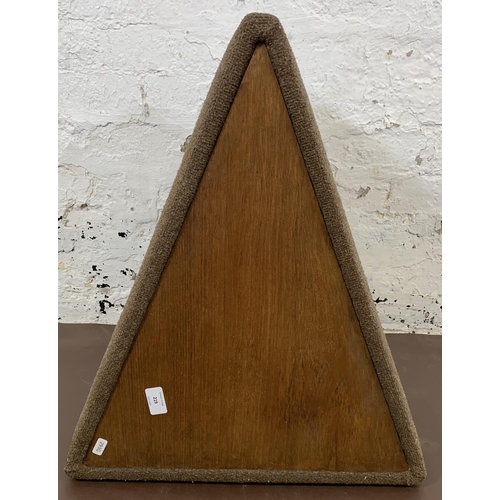 219 - A mid 20th century teak and brown upholstered triangular side table - approx. 38cm high x 60cm long ... 