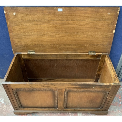 224 - A vintage carved oak blanket box - approx. 52cm high x 96cm long x 45cm wide