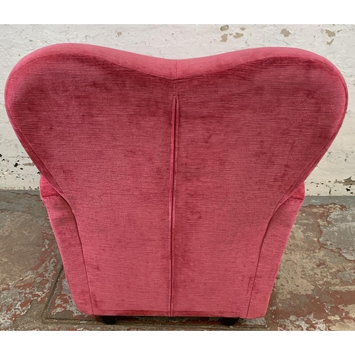 225 - A pink fabric upholstered armchair - approx. 86cm high x 68cm wide x 70cm deep