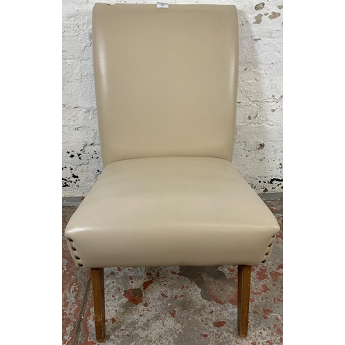 226 - A mid 20th century walnut and cream vinyl upholstered bedroom chair - approx. 79cm high x 48cm wide ... 