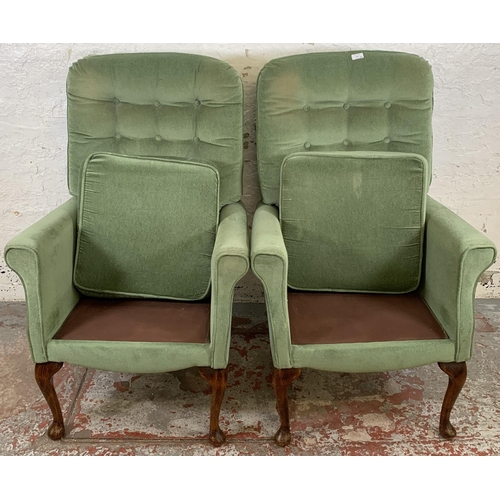 227 - A pair of vintage green fabric upholstered button back armchairs on cabriole supports - approx. 107c... 