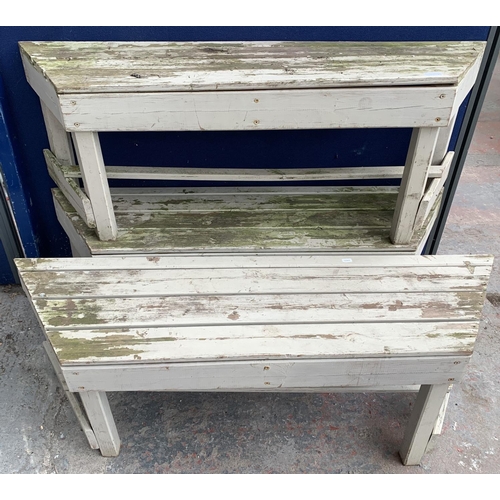 234 - Three matching painted pine garden benches - each approx. 46cm high x 127cm long x 34cm deep