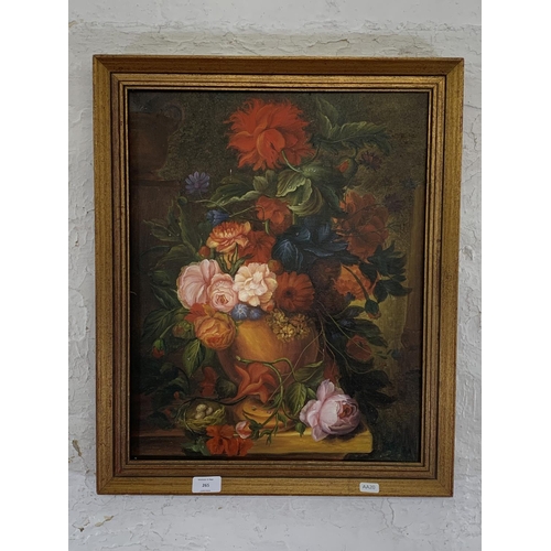 265 - A vintage framed oil on canvas of a still life floral scene - approx. 57cm high x 47cm wide