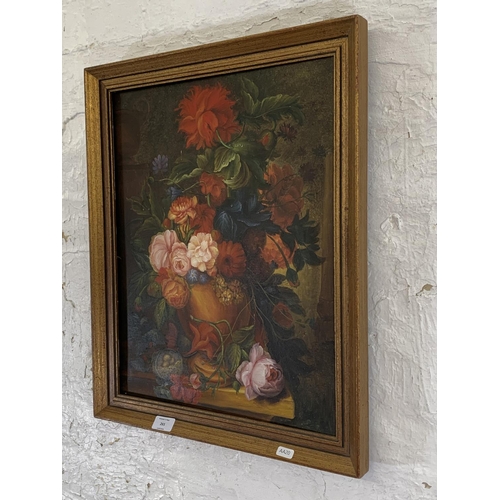 265 - A vintage framed oil on canvas of a still life floral scene - approx. 57cm high x 47cm wide