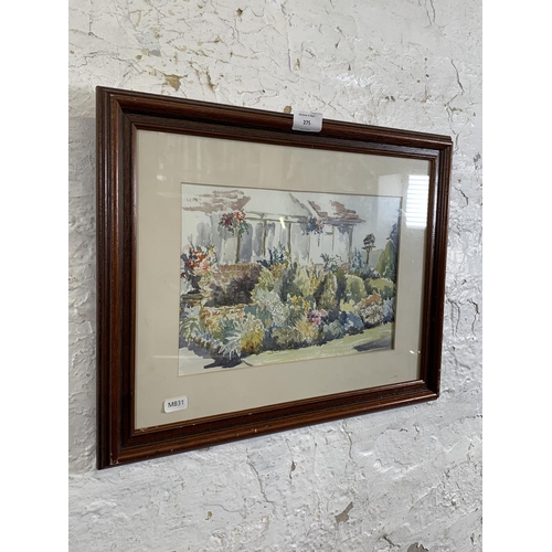 275 - A 20th century Daphne Challinor framed watercolour and ink painting of a garden scene signed lower r... 