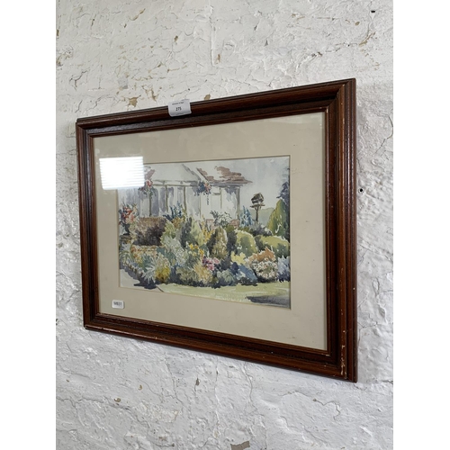 275 - A 20th century Daphne Challinor framed watercolour and ink painting of a garden scene signed lower r... 