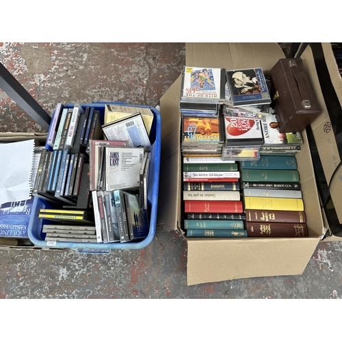 Five boxes and one containing books, CDs, DVDs, Toshiba VHS player ...