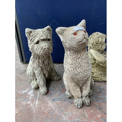 233 - Seven cast stone garden statues to include gnome, cat, rabbit etc. - largest approx. 37cm high