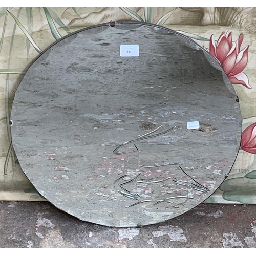 247 - A mid 20th century circular bevelled edge wall mirror with etched deer design - approx. 50cm in diam... 