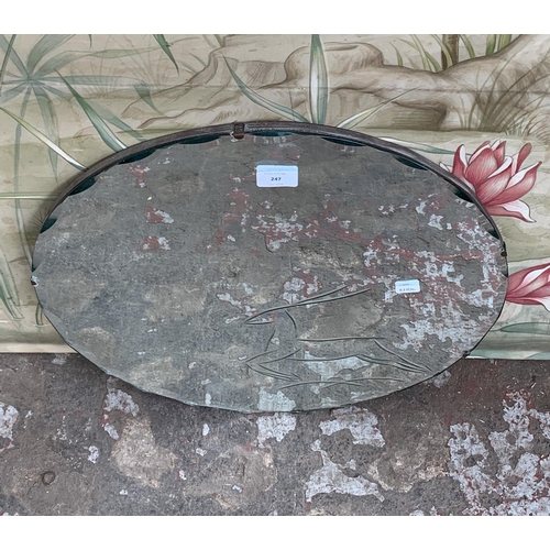 247 - A mid 20th century circular bevelled edge wall mirror with etched deer design - approx. 50cm in diam... 