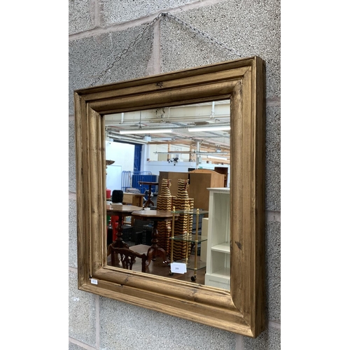 249 - A giltwood framed wall mirror with 19th century mirror plate - approx. 55cm high x 52cm wide