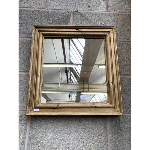 249 - A giltwood framed wall mirror with 19th century mirror plate - approx. 55cm high x 52cm wide