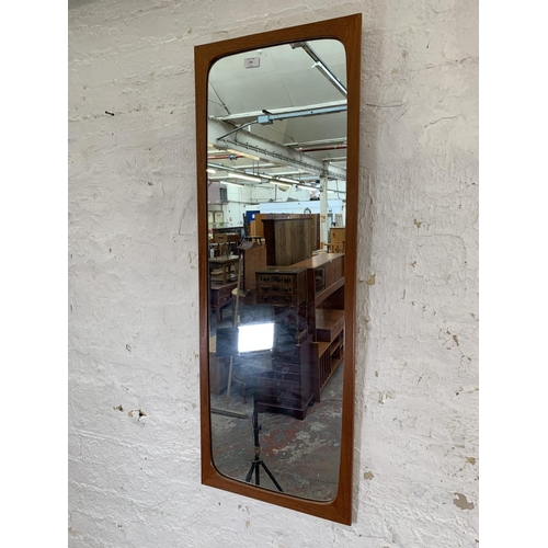 253 - A mid 20th century Danish teak wall mirror - approx. 114cm high x 42cm wide