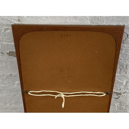 253 - A mid 20th century Danish teak wall mirror - approx. 114cm high x 42cm wide