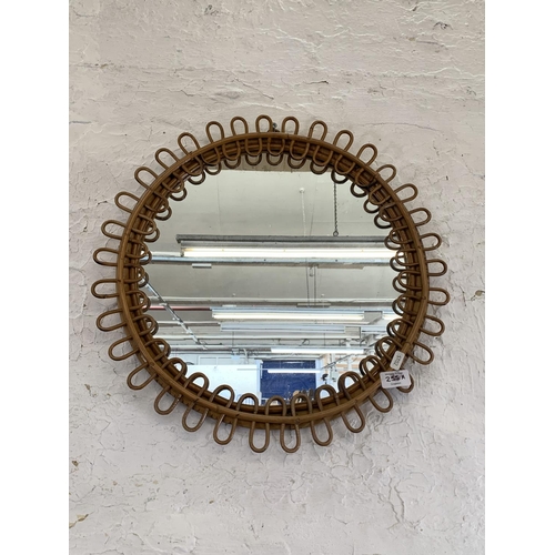 255A - A mid 20th century circular bamboo framed bohemian wall mirror - approx. 50cm in diameter