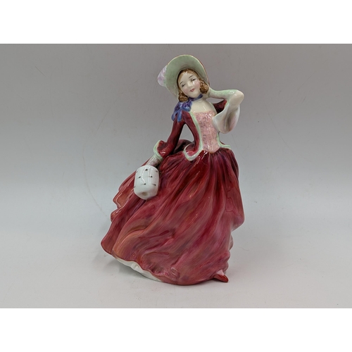 404 - Three Royal Doulton figurines, Autumn Breezes, Karen HN2388 and Lynne HN2329