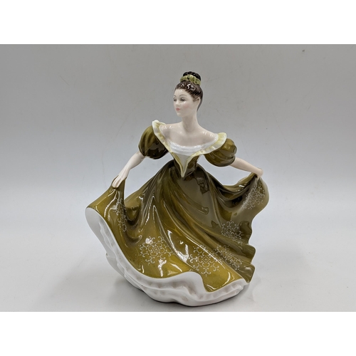 404 - Three Royal Doulton figurines, Autumn Breezes, Karen HN2388 and Lynne HN2329