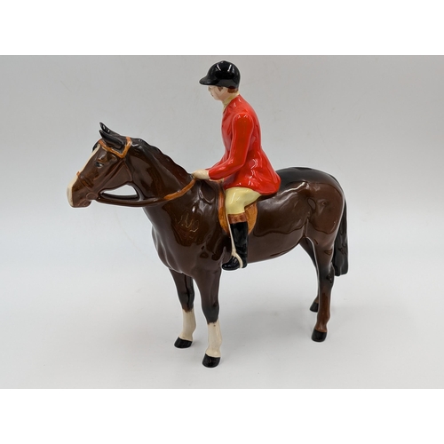 428 - Four Beswick figurines, Huntsman and Horse, Hound, Fox and Labrador - largest approx. 21.5cm high x ... 