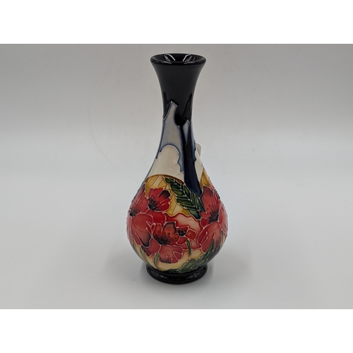 441 - A Moorcroft Pottery Forever England pattern tapered bud vase designed by Vicky Lovatt - approx. 17cm... 