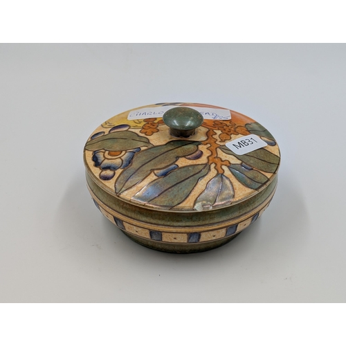 448 - A Charlotte Rhead for Bursley Ware hand painted ceramic circular trinket box - approx. 4cm high x 11... 