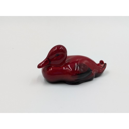 450 - A Royal Doulton Flambé Resting Duck - approx. 7cm long x 3.5cm wide