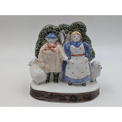 456 - A vintage Rye Pottery Shephard Neame And His Wife of Sussex flatback figurine - approx. 15cm high x ... 