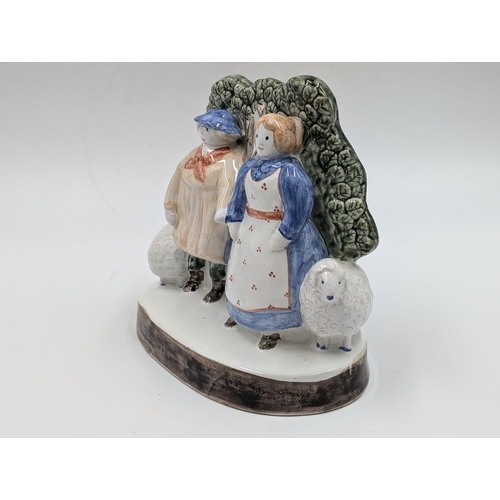 456 - A vintage Rye Pottery Shephard Neame And His Wife of Sussex flatback figurine - approx. 15cm high x ... 