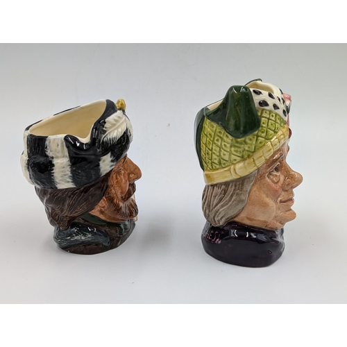 457 - Two Royal Doulton character jugs, Ugly Duchess - D6603 and The Trapper - D6612