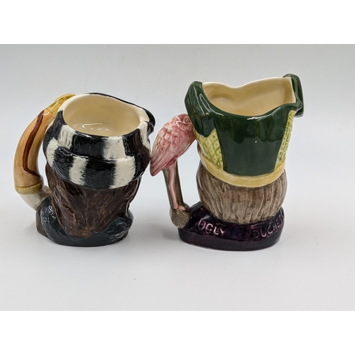 457 - Two Royal Doulton character jugs, Ugly Duchess - D6603 and The Trapper - D6612