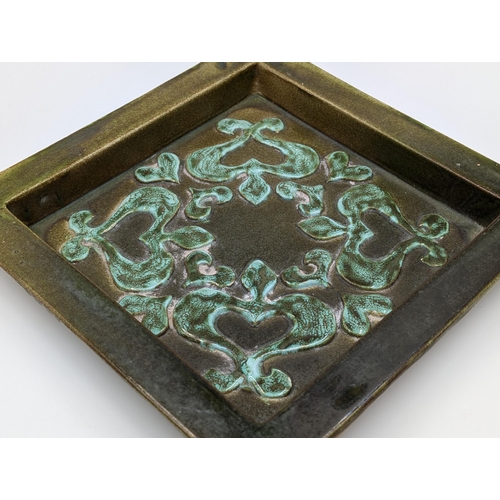 462 - A mid 20th century Keramikos Poole studio pottery square dish, signed to reverse 'J M. Potts' - appr... 