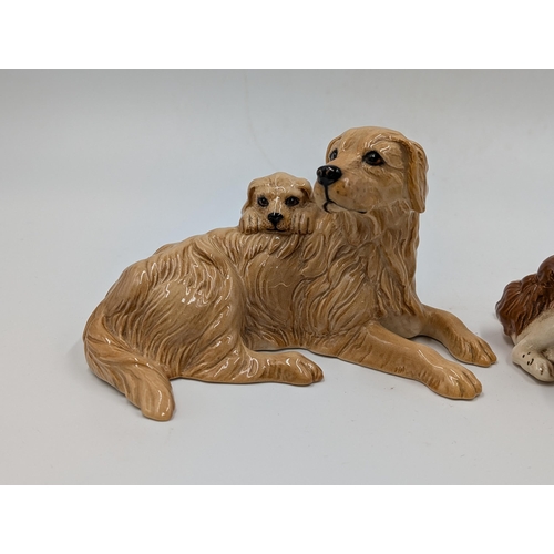 463 - Two Royal Doulton ceramic dog figurines, one Cocker Spaniel with Puppy - DA174 and one Golden Retrie... 