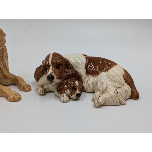 463 - Two Royal Doulton ceramic dog figurines, one Cocker Spaniel with Puppy - DA174 and one Golden Retrie... 