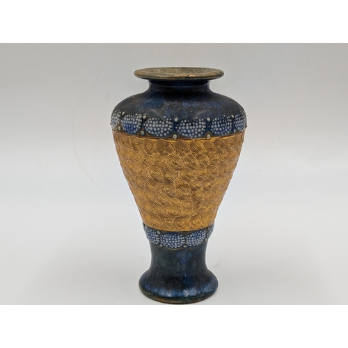 469 - A Royal Doulton blue glazed and gold painted tapered vase - approx. 15cm high