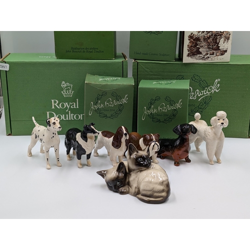 477 - Seven Beswick animal figurines to include bulldog, Dachshund, Dalmatian, Sheepdog, Siamese Cats etc.