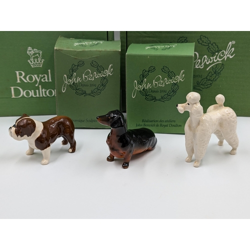 477 - Seven Beswick animal figurines to include bulldog, Dachshund, Dalmatian, Sheepdog, Siamese Cats etc.