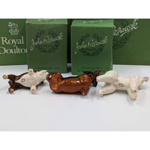 477 - Seven Beswick animal figurines to include bulldog, Dachshund, Dalmatian, Sheepdog, Siamese Cats etc.