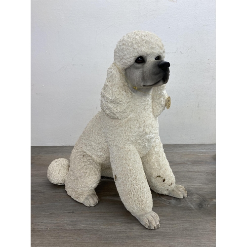 494 - A pair of Leonardo resin poodle figurines - approx. 41cm high