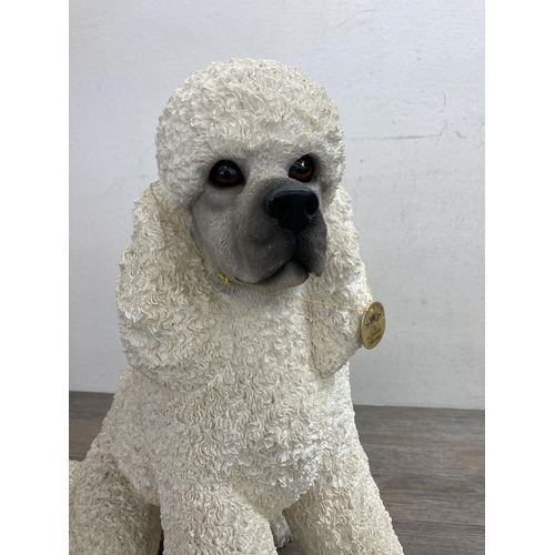 494 - A pair of Leonardo resin poodle figurines - approx. 41cm high